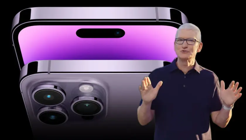 Tim Cook obok fioletowego iPhone'a 14 z widocznym modułem aparatów.